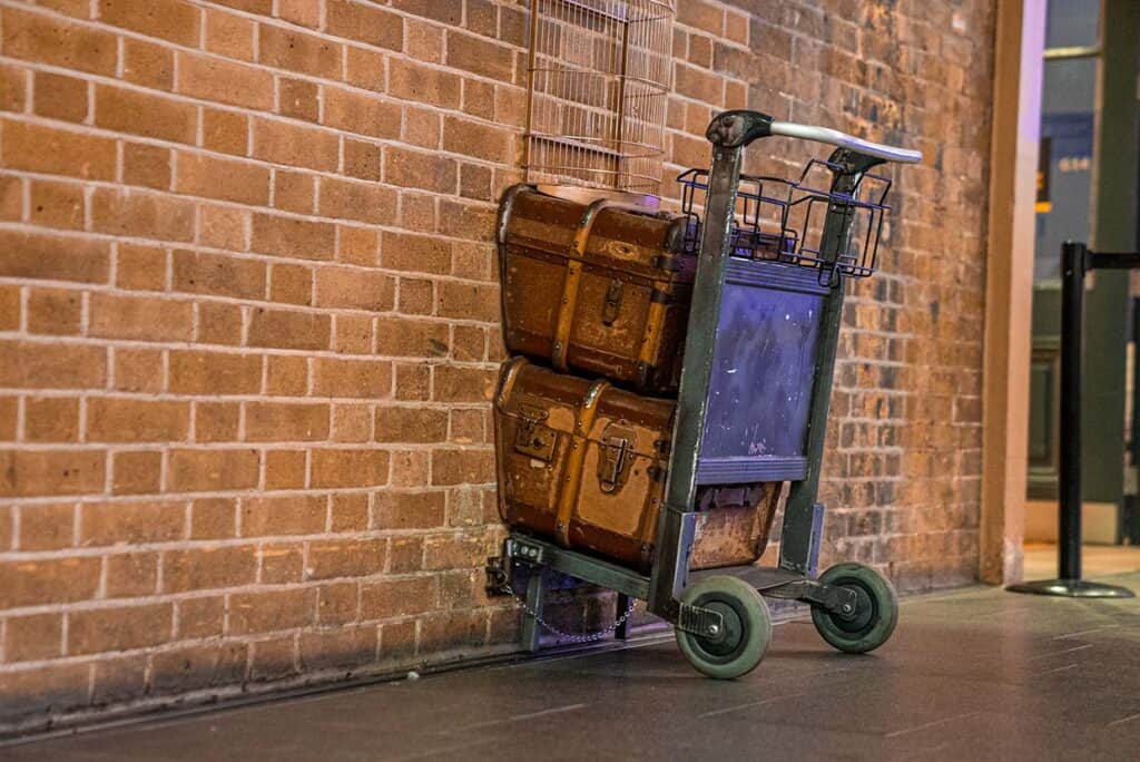 A luggage trolley halfway through the wall at Platform 9¾ Harry Potter's platform in Kings Cross.