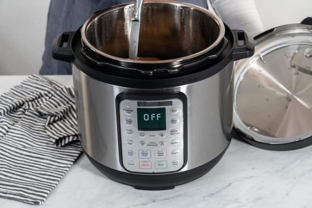 Instant pot being used for pressure cooking.
