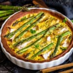 Asparagus Keto Quiche in white tart pan.