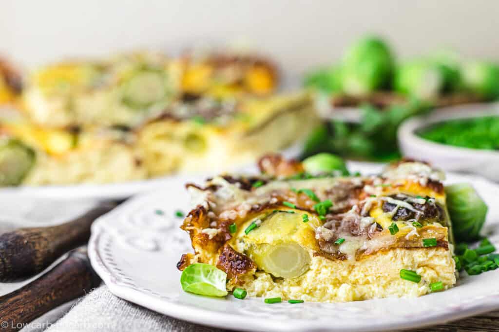 A serving of Brussels Sprouts Casserole on a white plate.