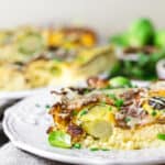 A serving of Brussels Sprouts Casserole on a white plate.