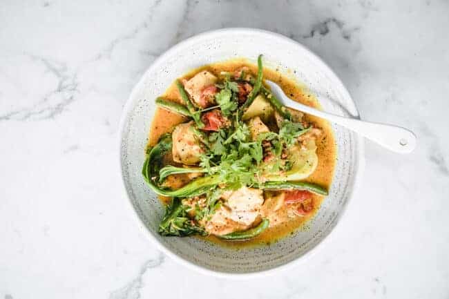 Curry salmon with coconut milk and bok choy.