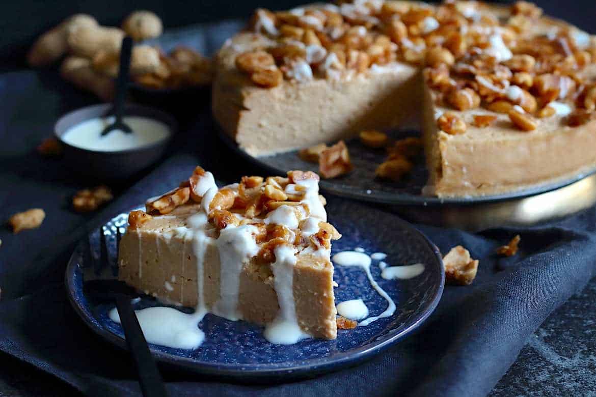 A slice of peanut butter cheesecake on a plate.