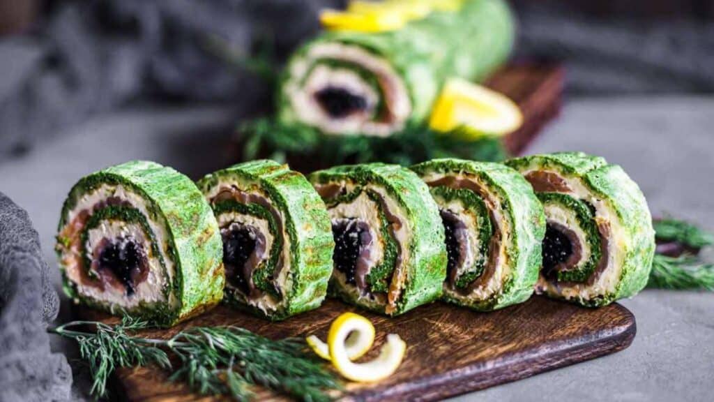 Spinach Salmon Roulade on cutting board.