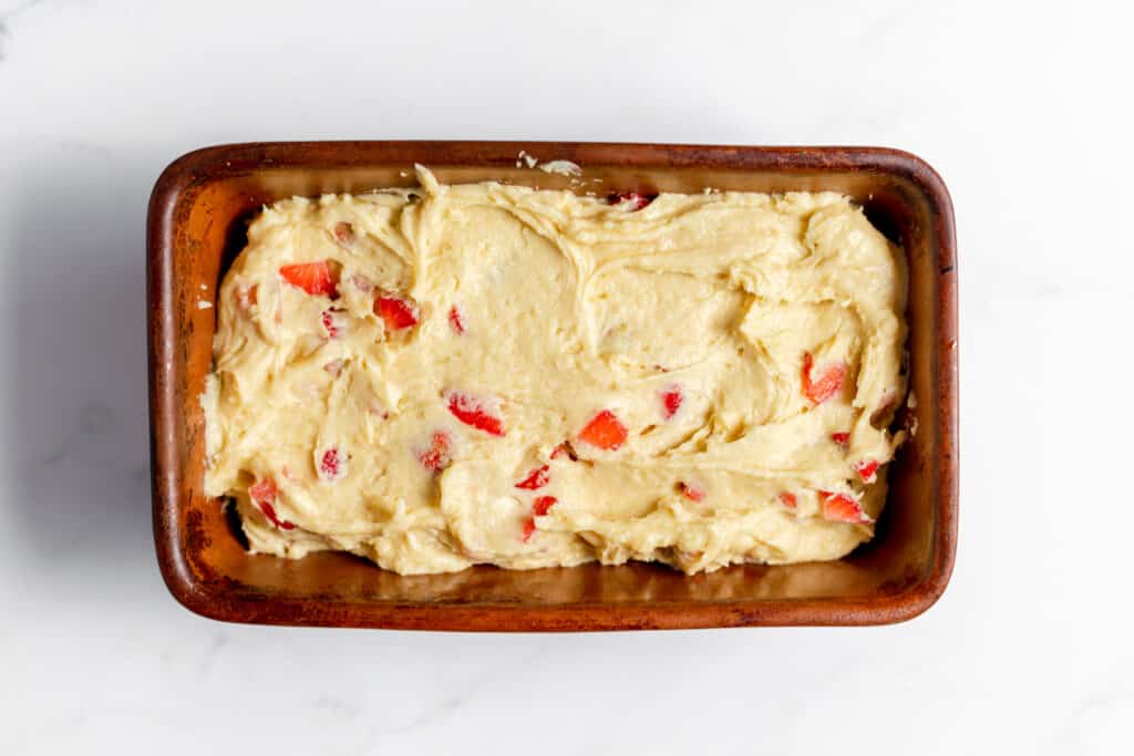 Strawberry bread in a loaf pan. 