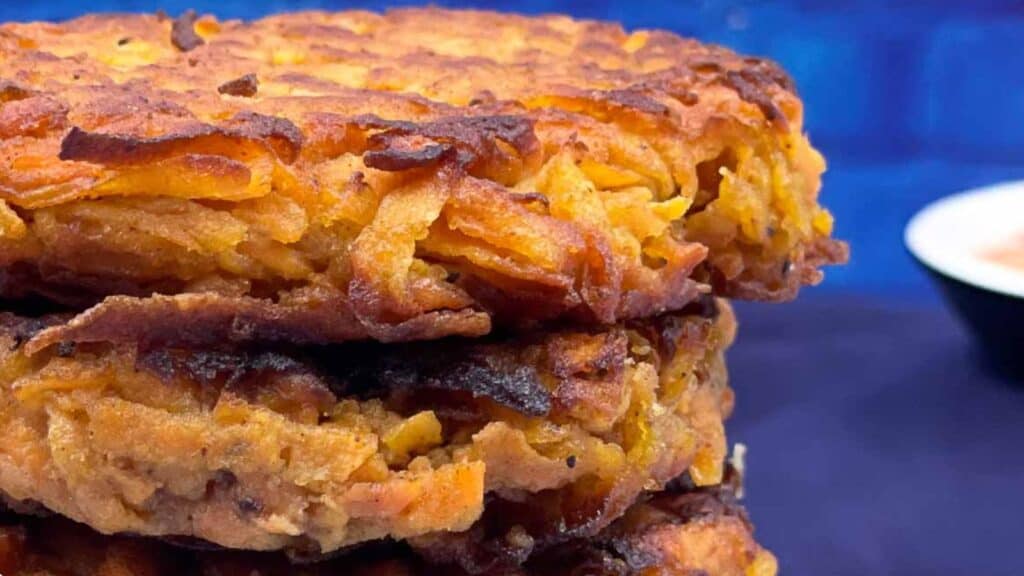 Sweet potato fritters in a stack.