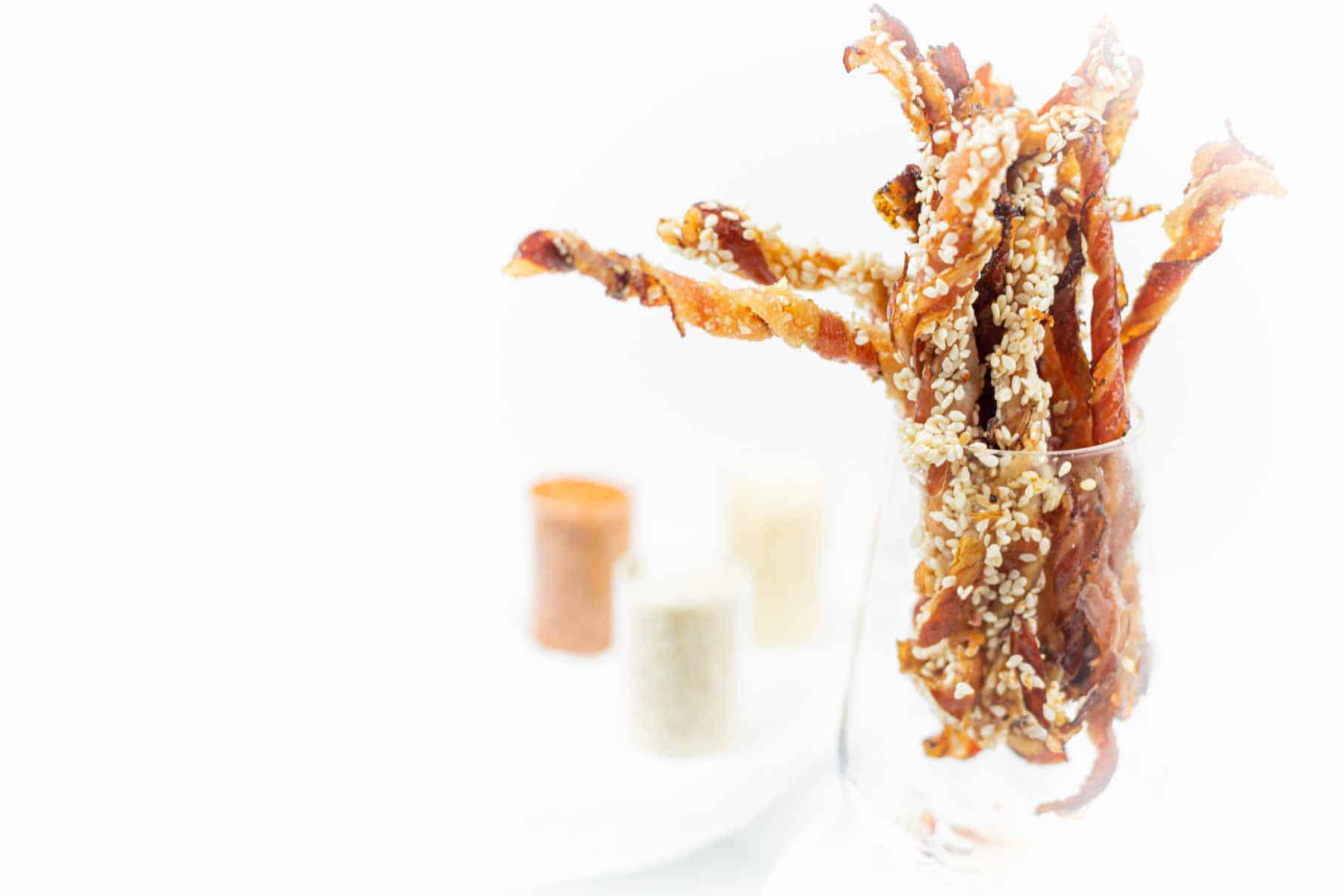 Savory Twisted Bacon in a glass.