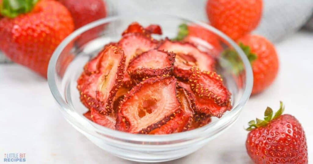 Air-fried strawberries in glass bowl.