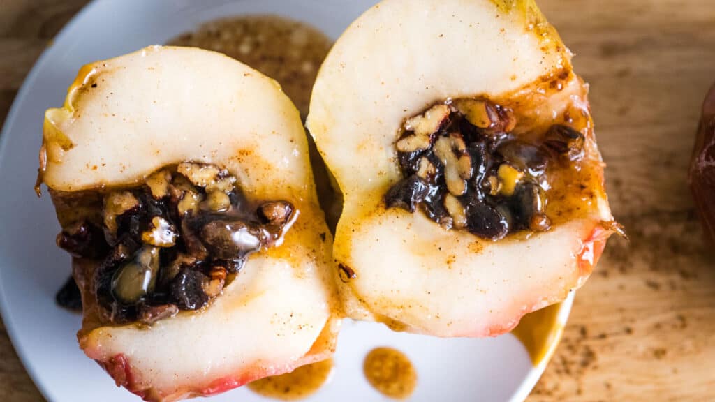 Air Fryer Baked Apples cut in half to show filling.