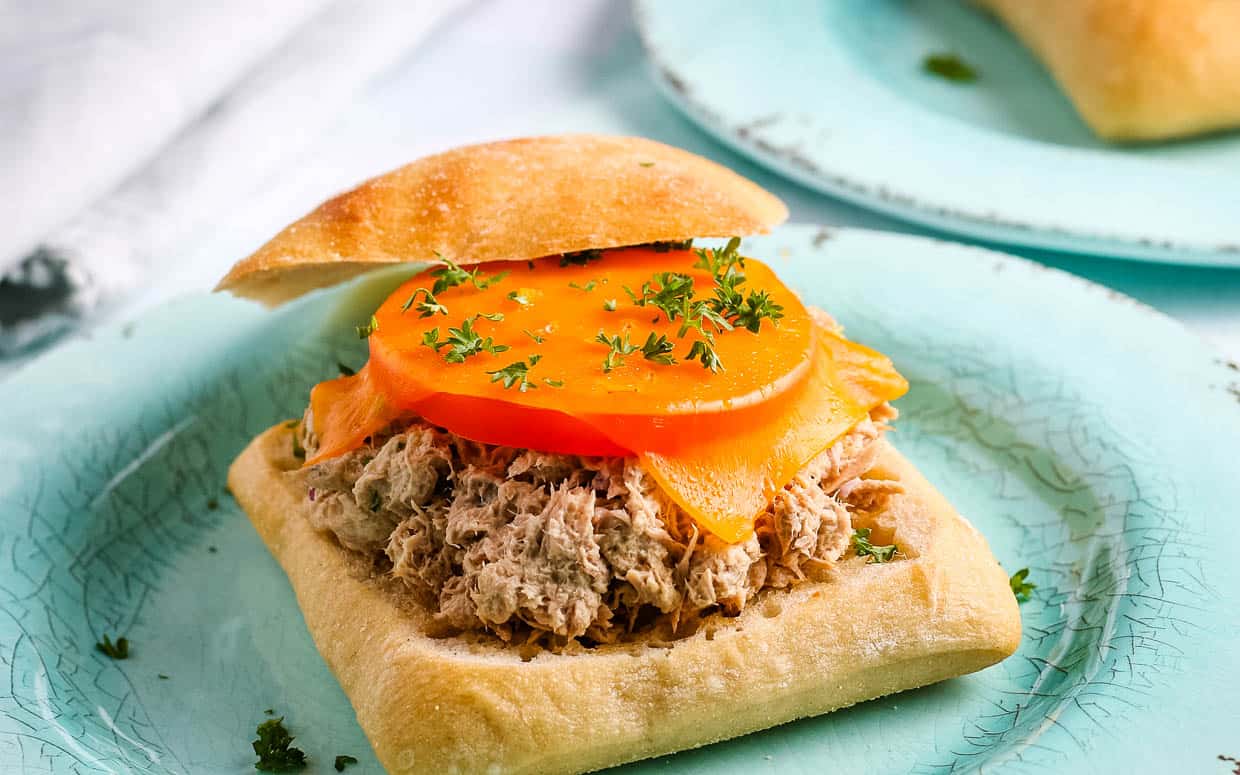 Tuna melt air fried and topped with cheese and tomato slices.