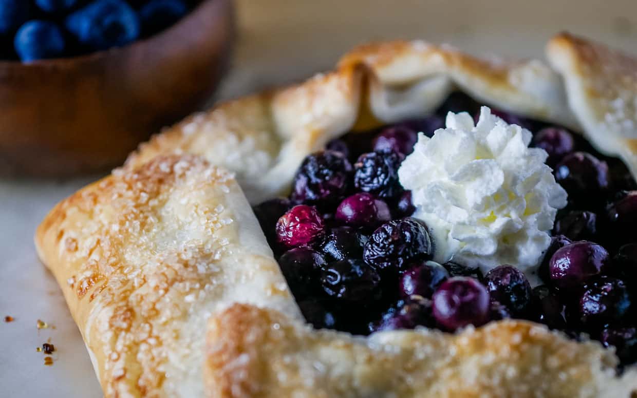 Blueberry galette with ice cream.
