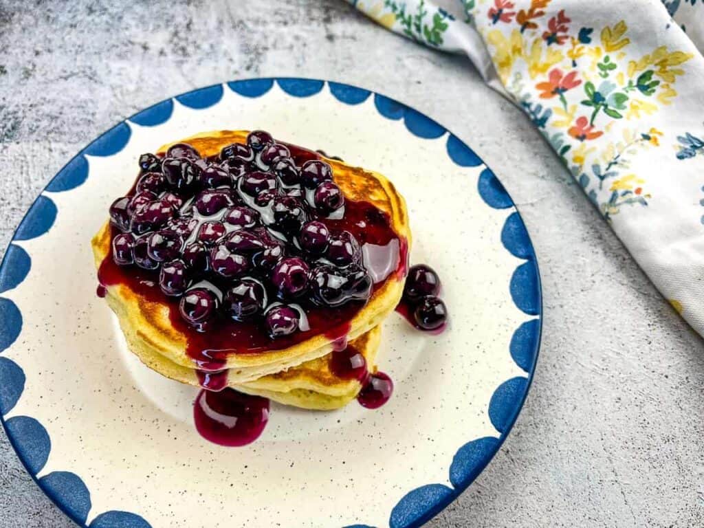 blackstone pancakes with blueberries on top