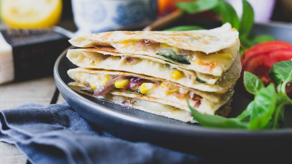 Cheddar quesadilla with summer vegetables.