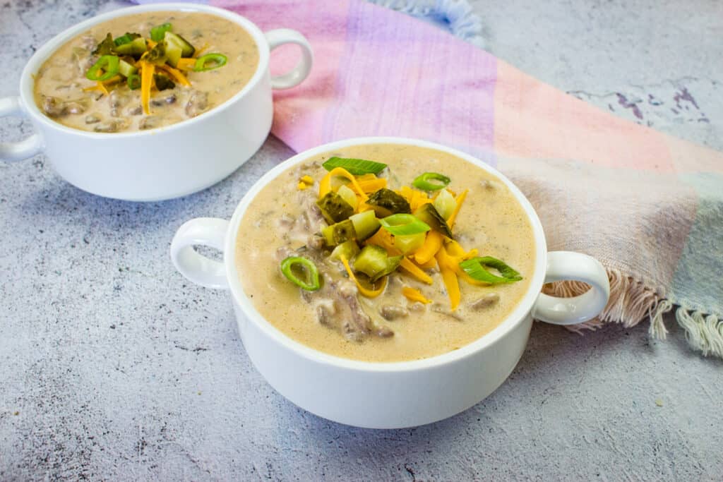 Cheeseburger Soup in two bowls.