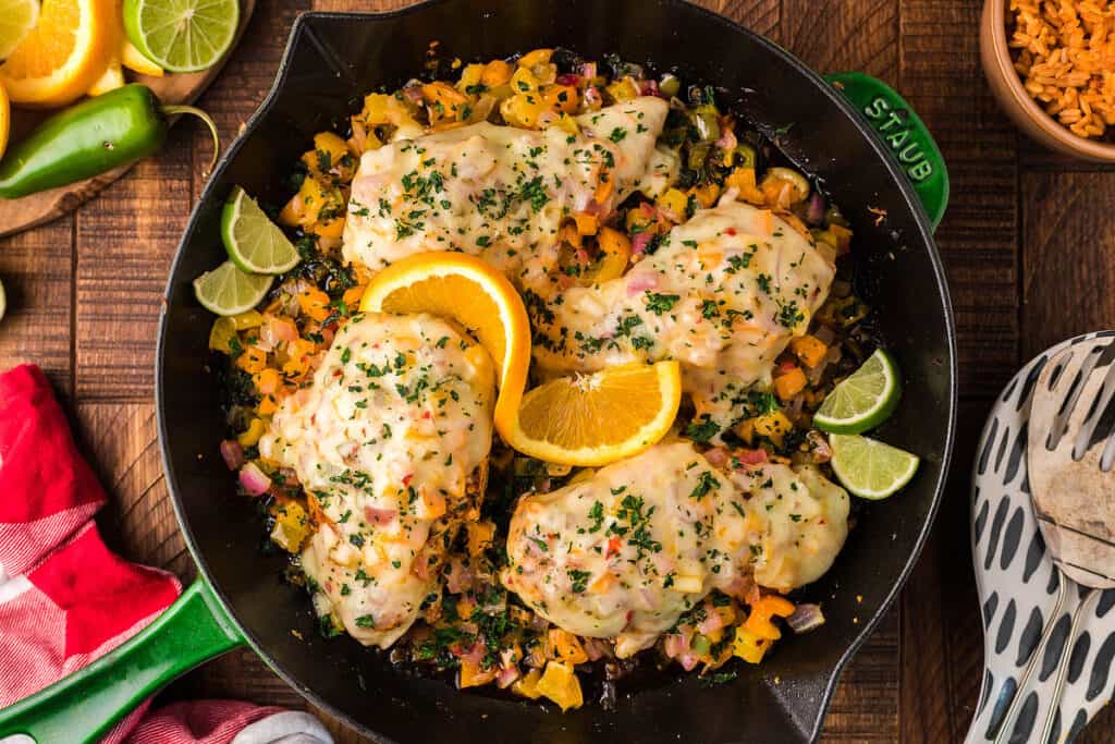 Chicken with lemon and orange slices.