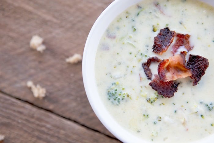 Soup in a bowl with bacon bits. 