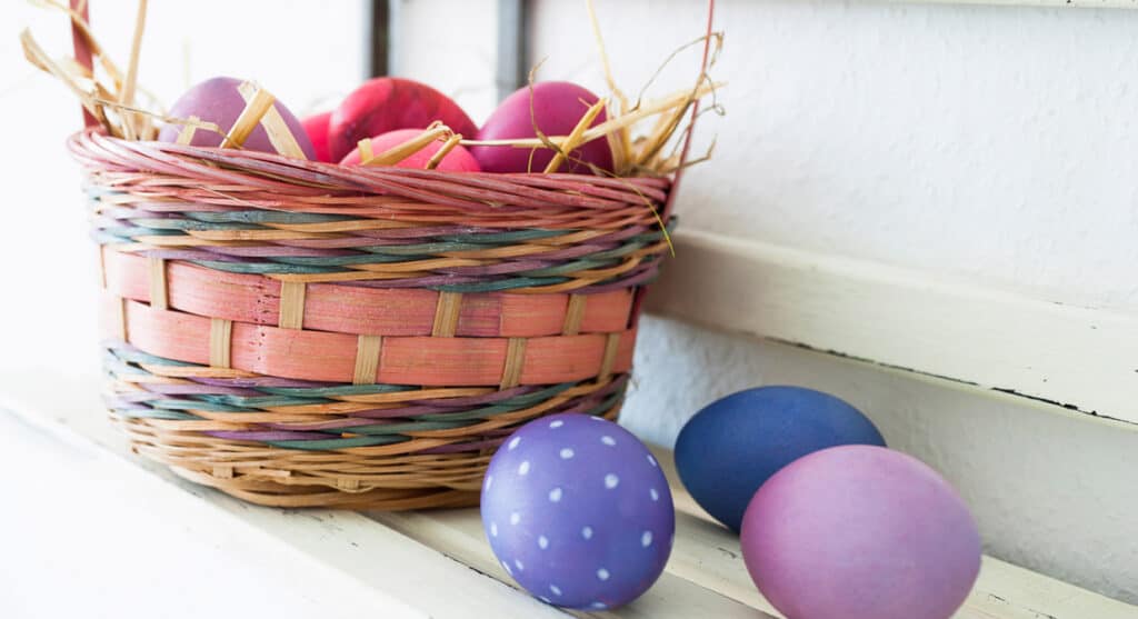 Easter basket on a bench.