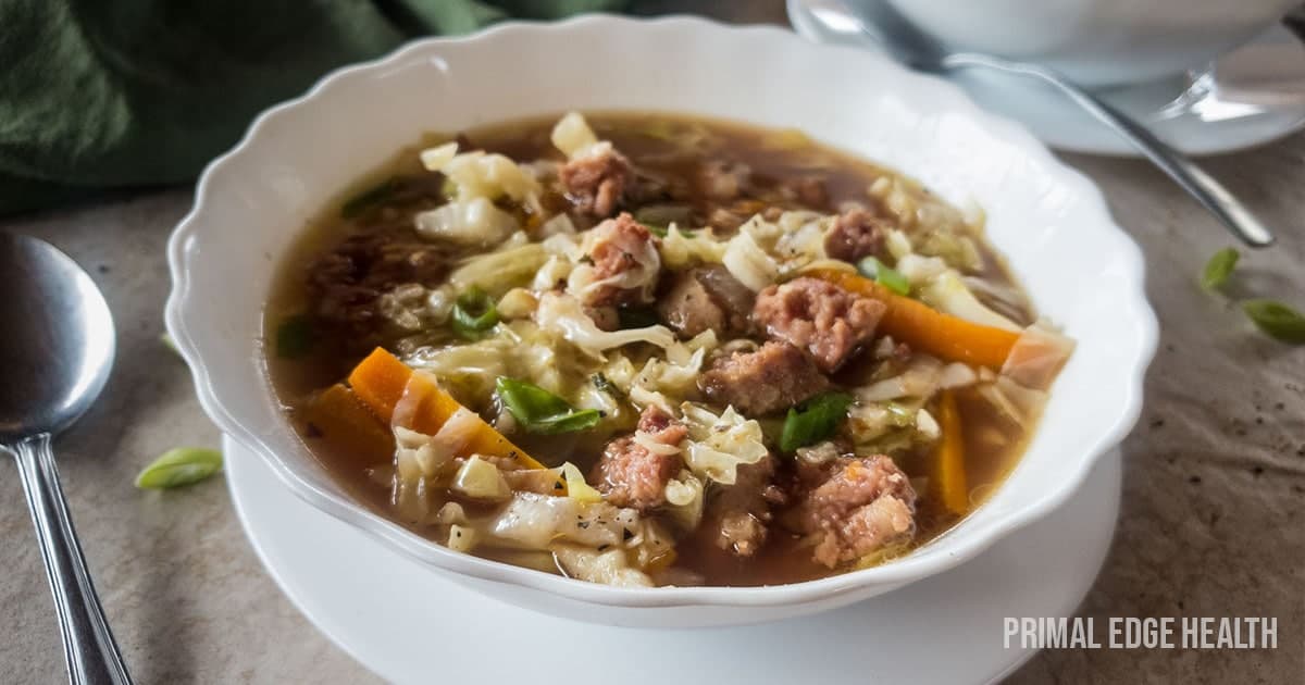 cabbage carrot sausage in broth soup