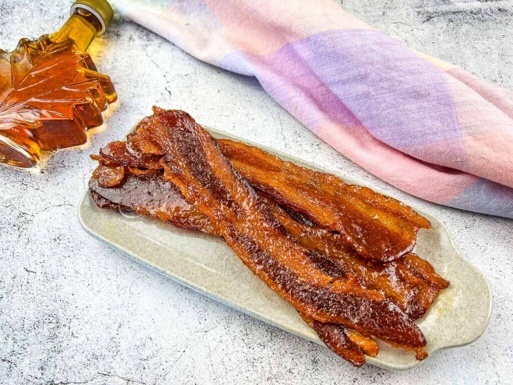 Sweet & Spicy Smoked Candied Bacon on a plate.