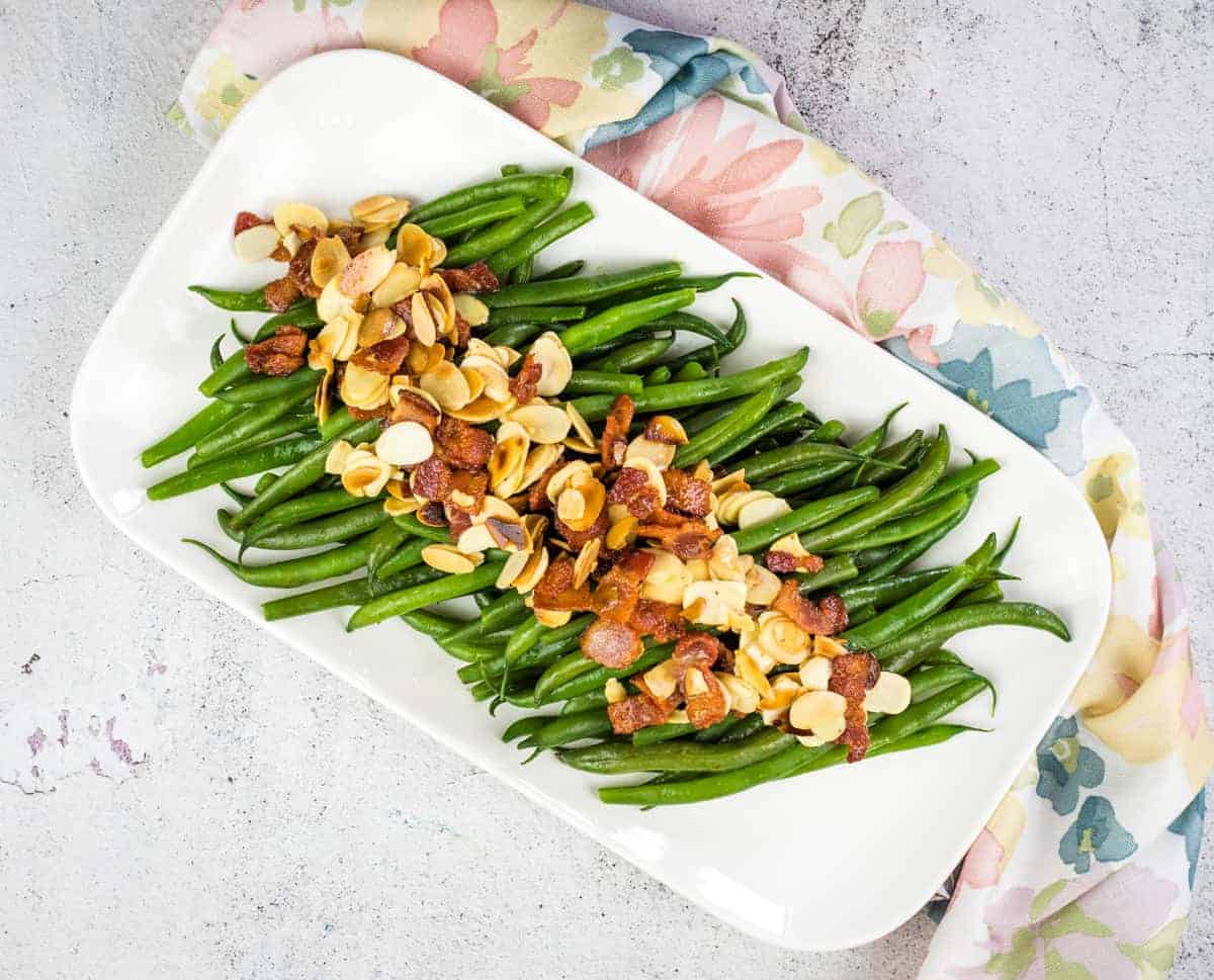 Green Beans Almondine with Bacon on a plate.