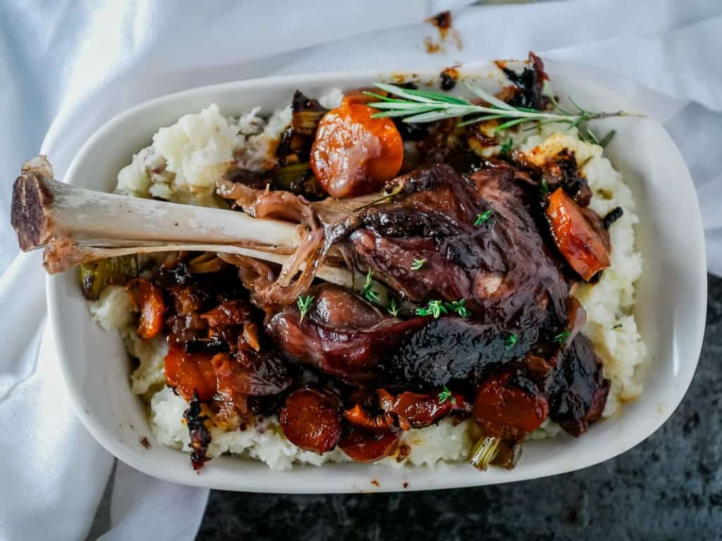 Lamb shank over mashed potatoes made in the Instant Pot.