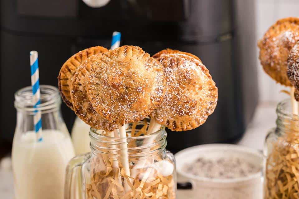 Air Fryer S’more Pie Pops with Nutella in a mason jar.