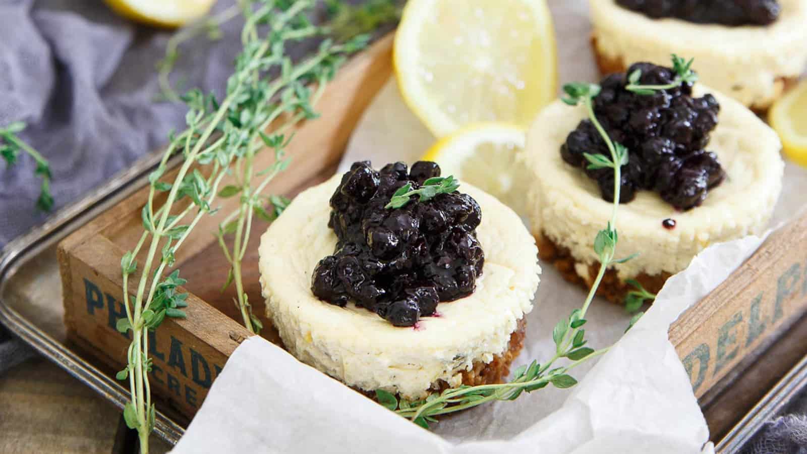 Mini lemon blueberry cheesecakes with granola crust.