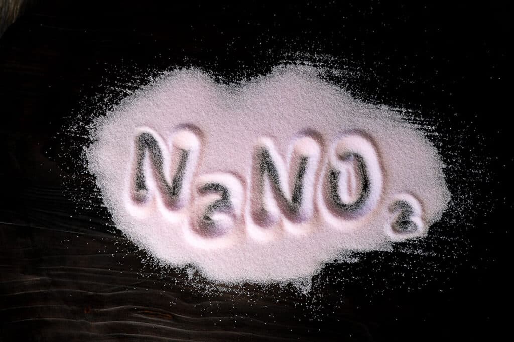 Sodium nitrite on a tablew ith NaNO2 written in it.