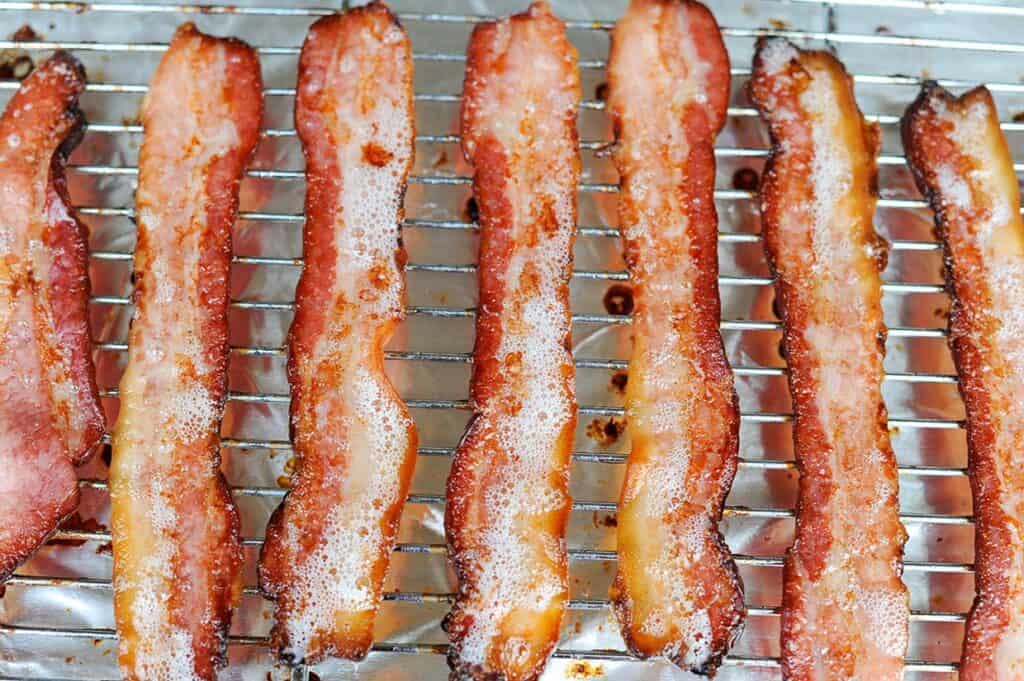 Bacon on a wire rack.