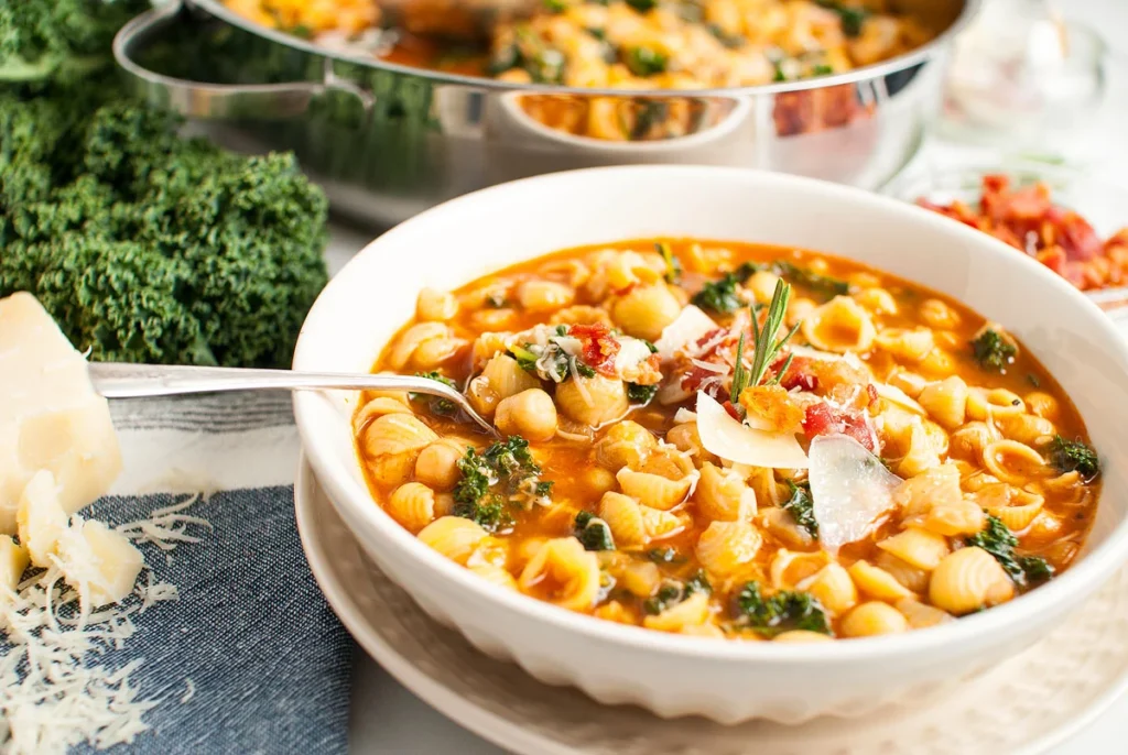 Pasta and chickpea stew in a bowl. 