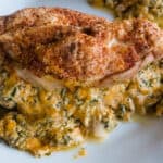 A picture of stuffed chicken breast with paprika.