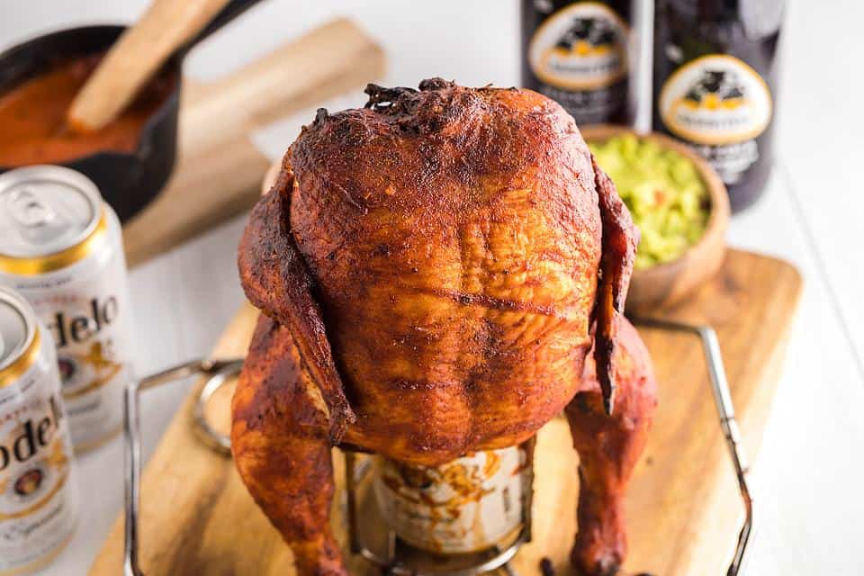 A chicken that has been smoked on a beer can.