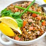 Wheat Berry Salad with Tomato & Tuna in a bowl.