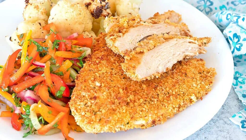 air fryer chicken cutlets with peppers and cauliflower.