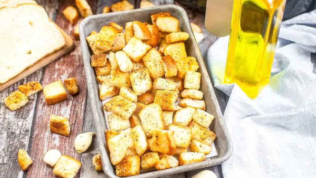 croutons on a small metal baking sheet.