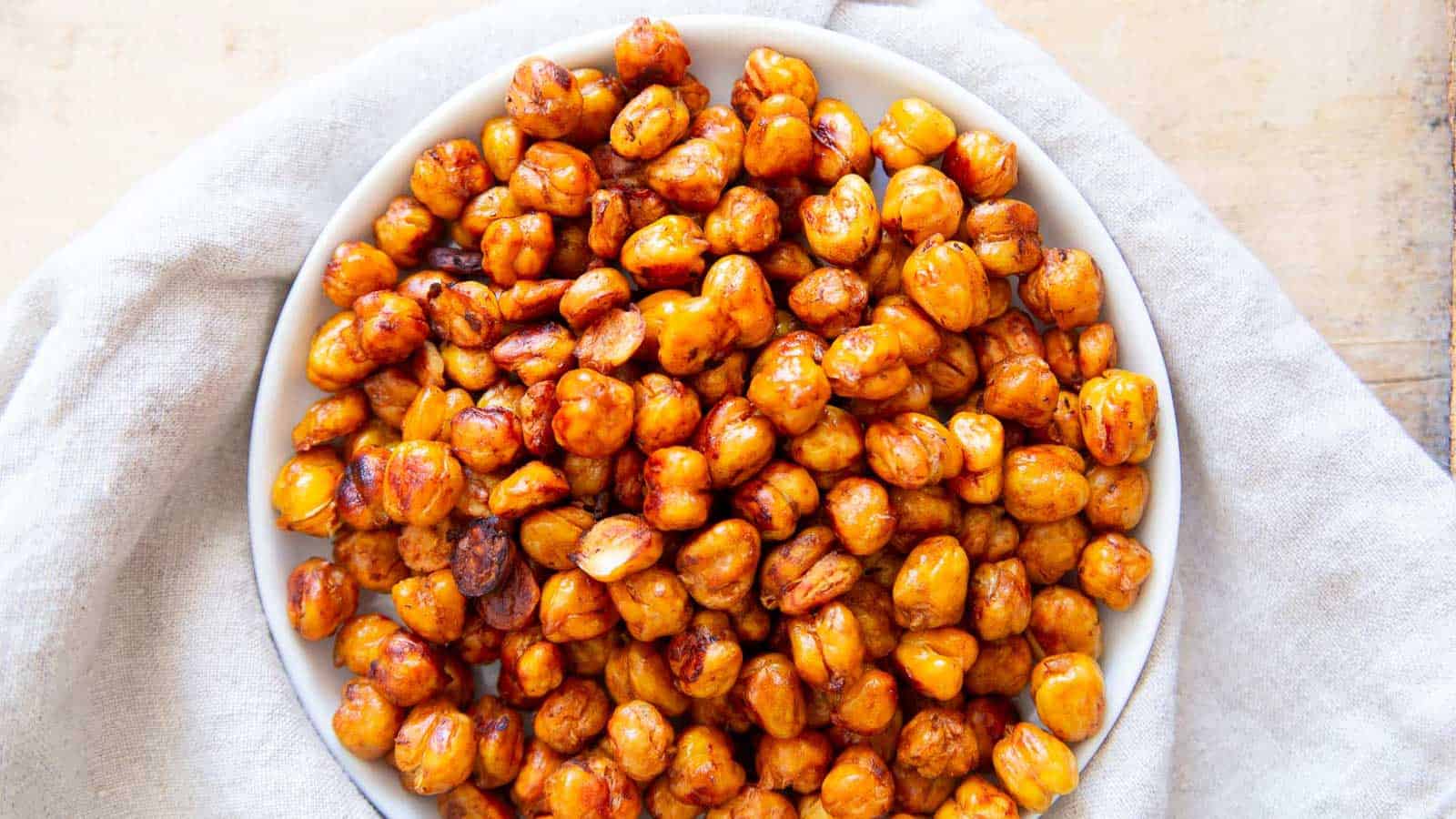 BBQ roasted chickpeas on a white plate.