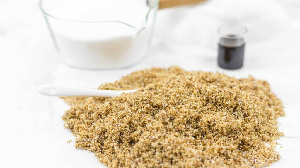 Brown Sugar on a table with white sugar in the background.