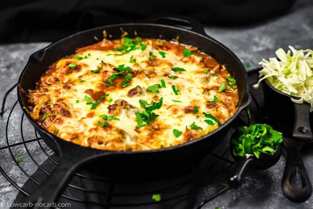 Cheesy Cabbage Beef Casserole in cast iron skillet