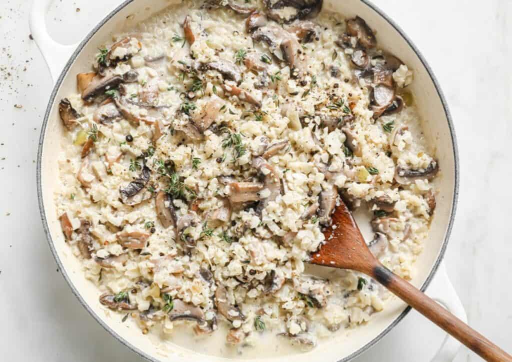Cauliflower risotto in a pan.