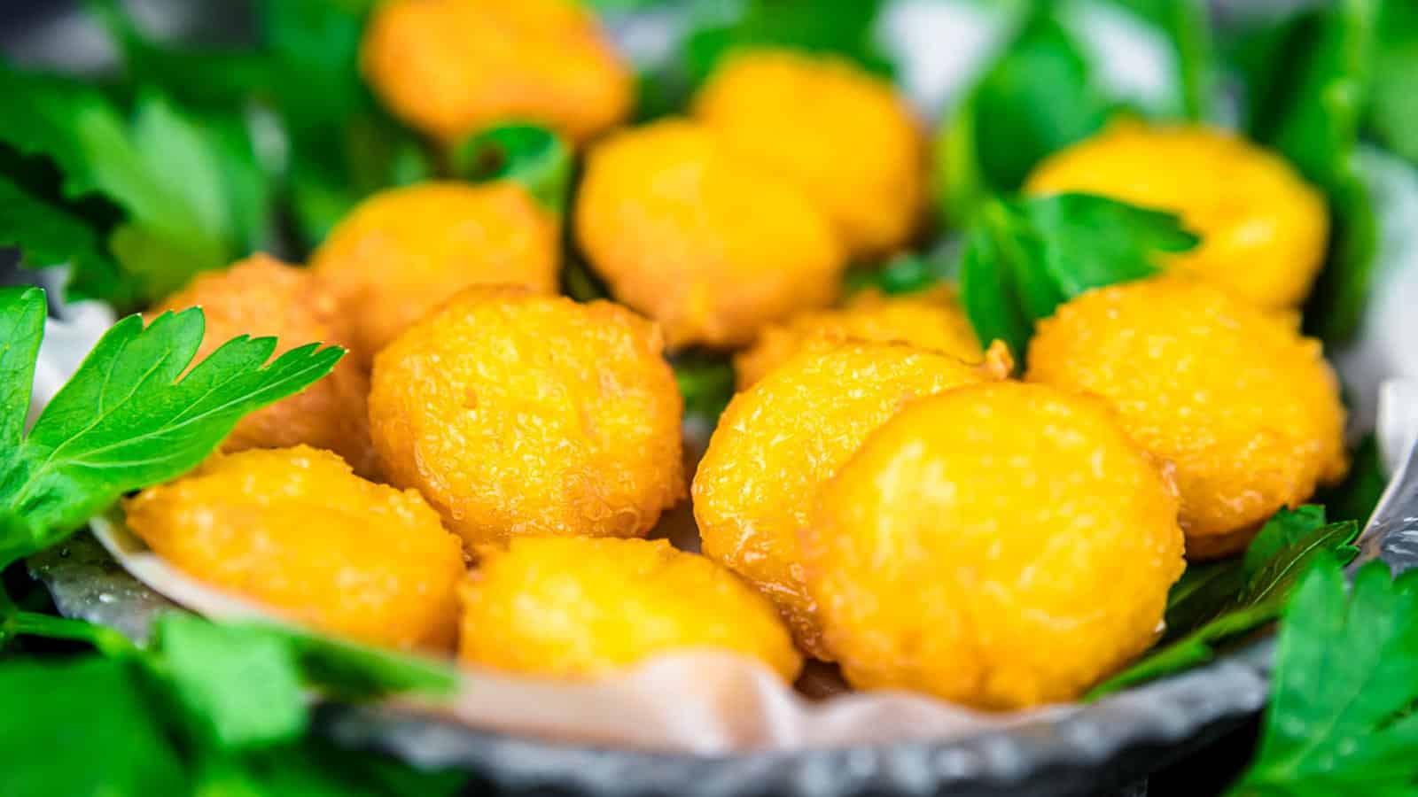 Keto Fried Cheese Balls with parsley.