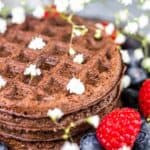 Chocolate Chaffle with white flowers.