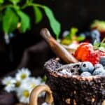 Chocolate Mug Cake with berries on top.
