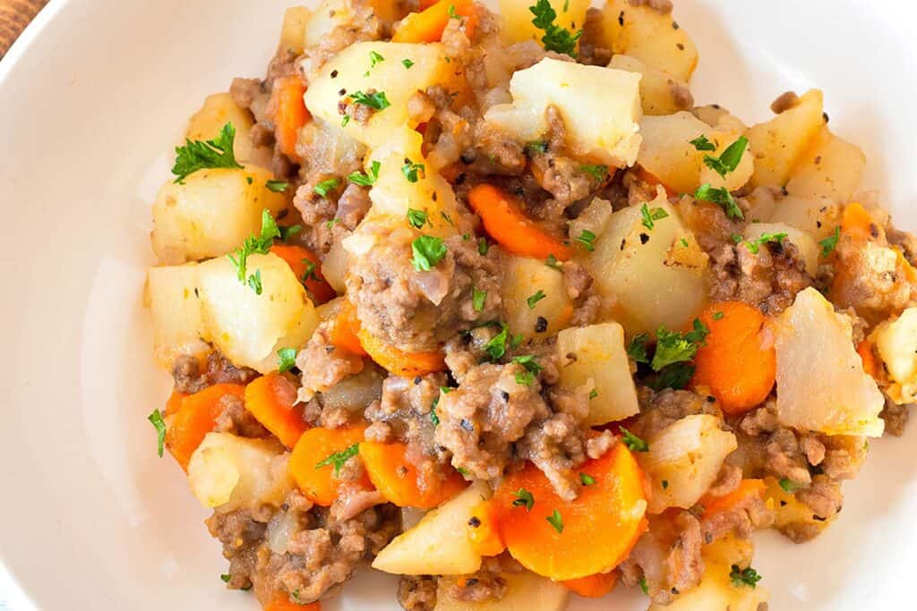 Ground Beef and Potato Casserole on a white plate.