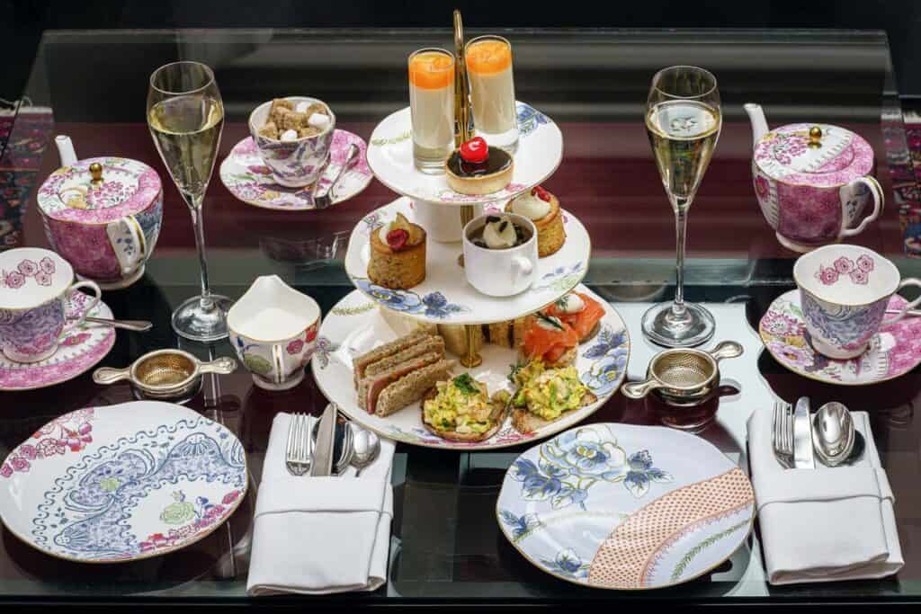 High tea spread with champagne.