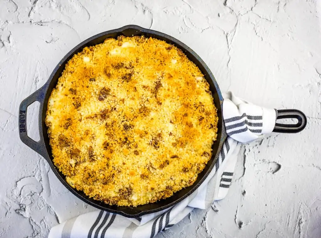 Smoked Mac and Cheese in a black cast iron pan.