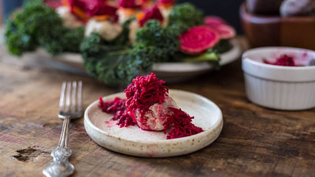 gefilte fish on plate with beet horseradish