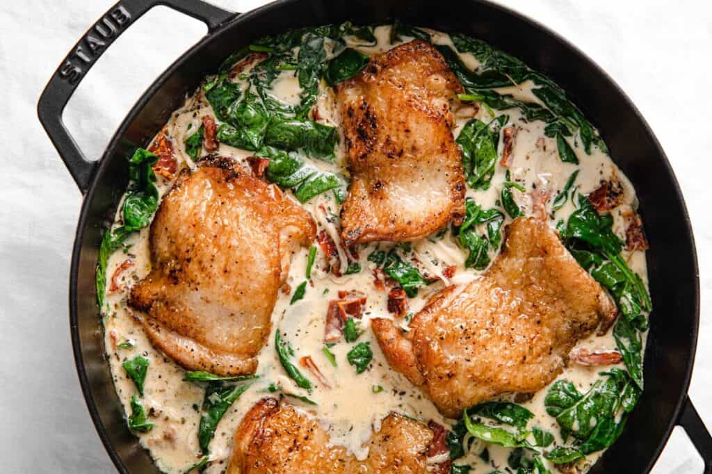 A skillet of creamy Tuscan chicken.