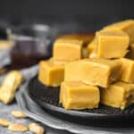 Peanut Butter Fudge on a black plate.