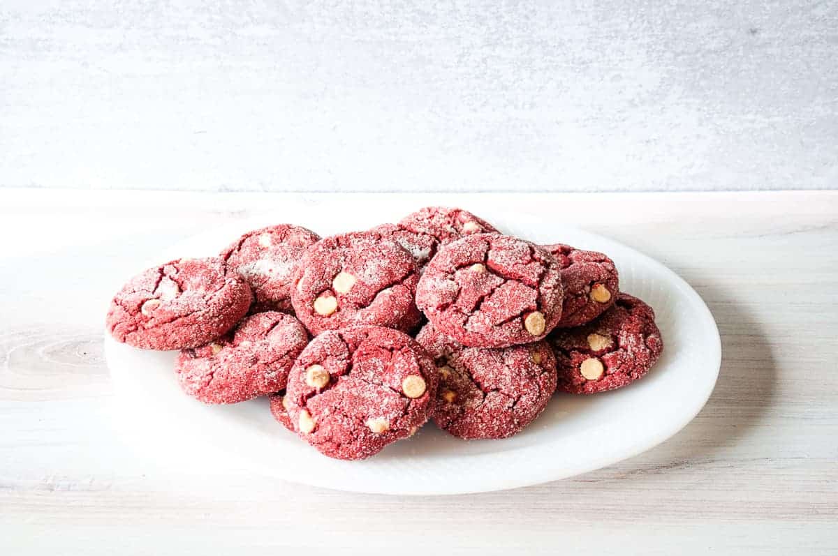 Red velvet cookies rolled in sugar.
