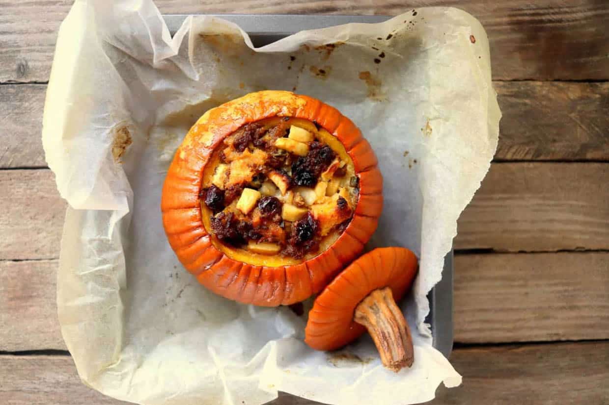A pumpkin stuffed and bakked in a pan.
